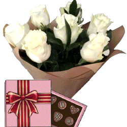 Фото товара 7 білих троянд із цукерками