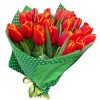 Фото товара 15 червоних тюльпанів у зеленій упаковці